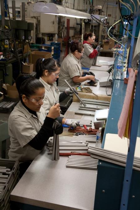 Workers Assembling Products